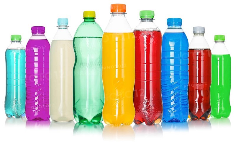 Bottles with colourful drinks