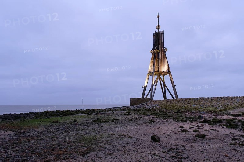 Illuminated Kugelbake at blue hour