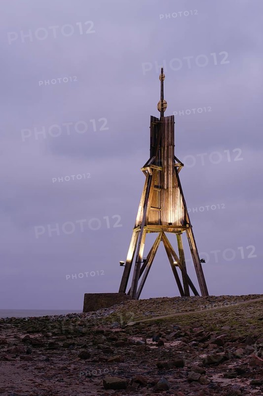 Illuminated Kugelbake at blue hour