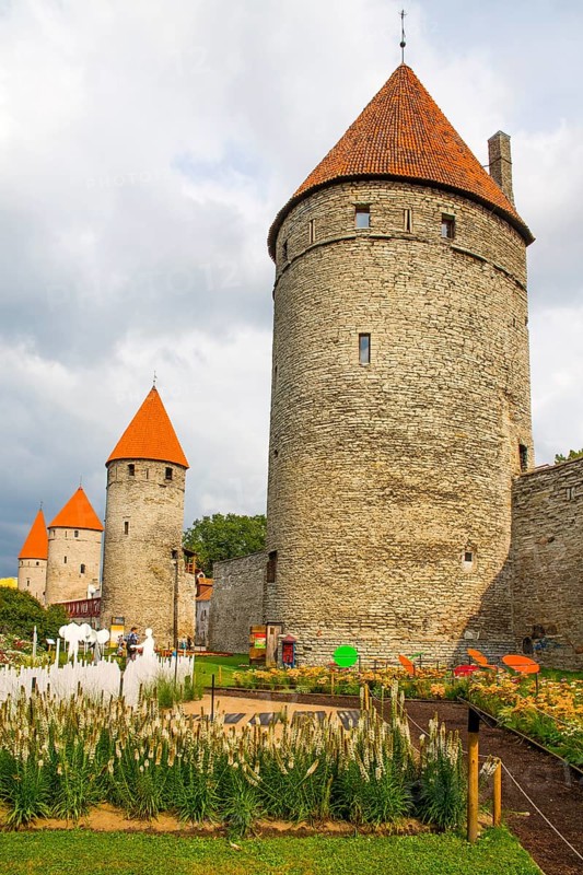 Medieval city fortification with battlements and defence towers