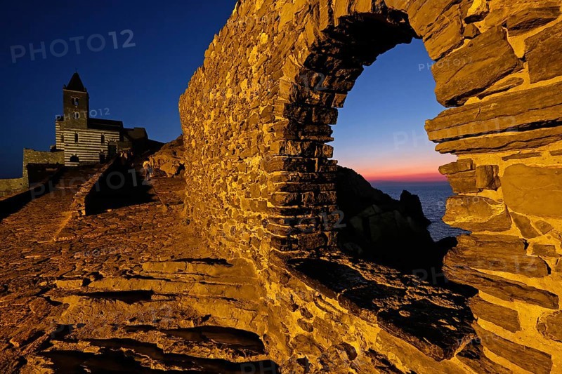 Historic church Chiesa San Pietro in Porto Venere at sunset