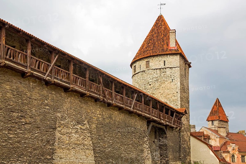 Medieval city fortification with battlements and defence towers