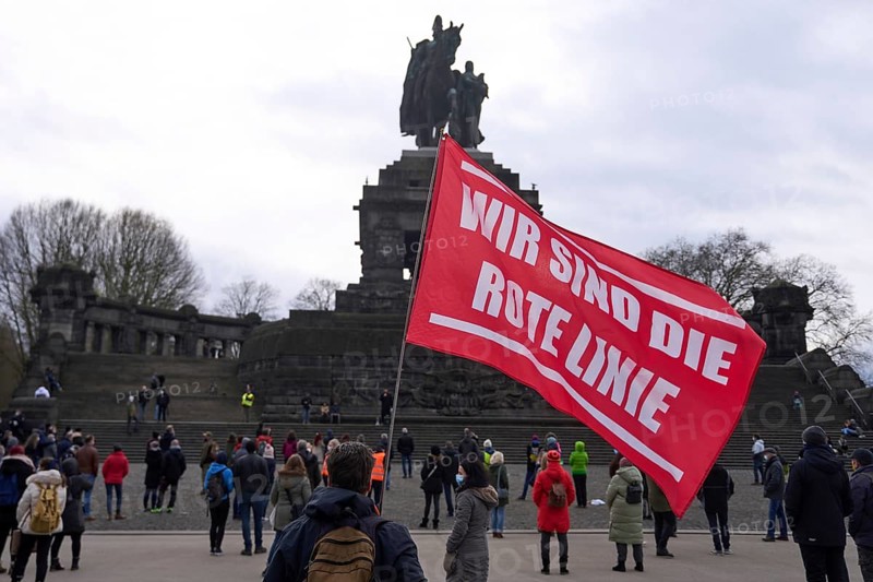 Opponents of the Corona measures demonstrate with flags and banners at the Deutsches Eck in Koblenz