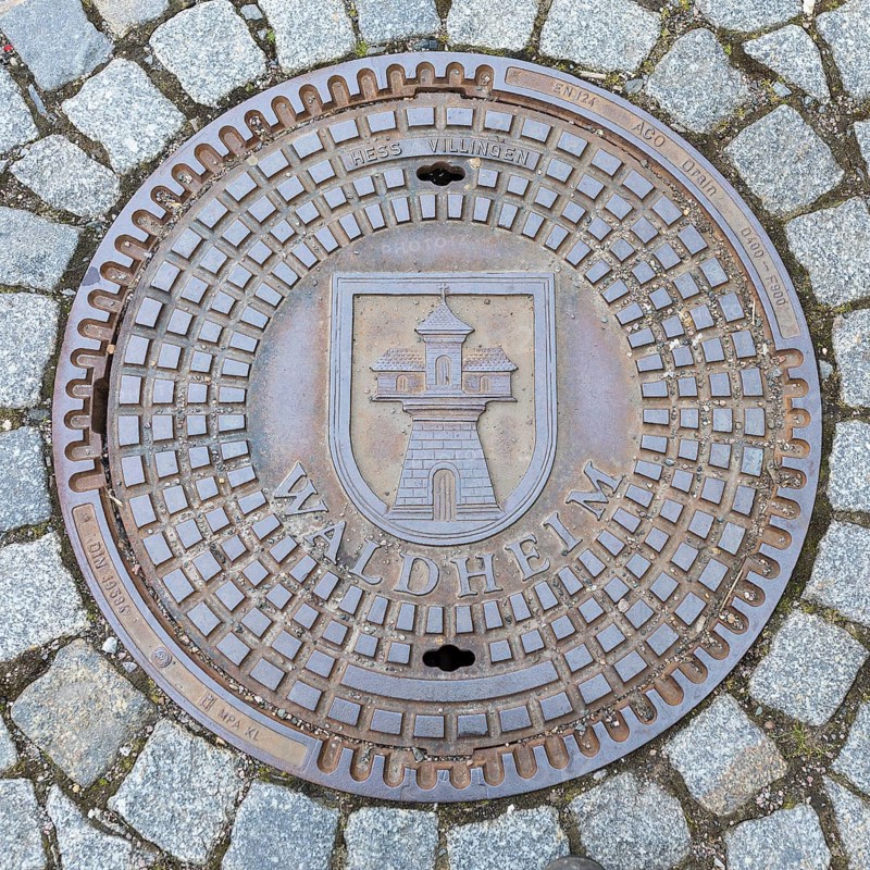 Manhole cover with coat of arms of Waldheim