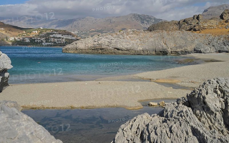 Sandy beach Ammoudi Beach