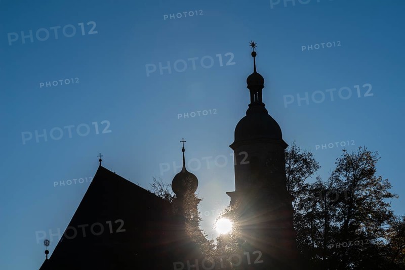Silhouette of the Franciscan church and tower of the parish church