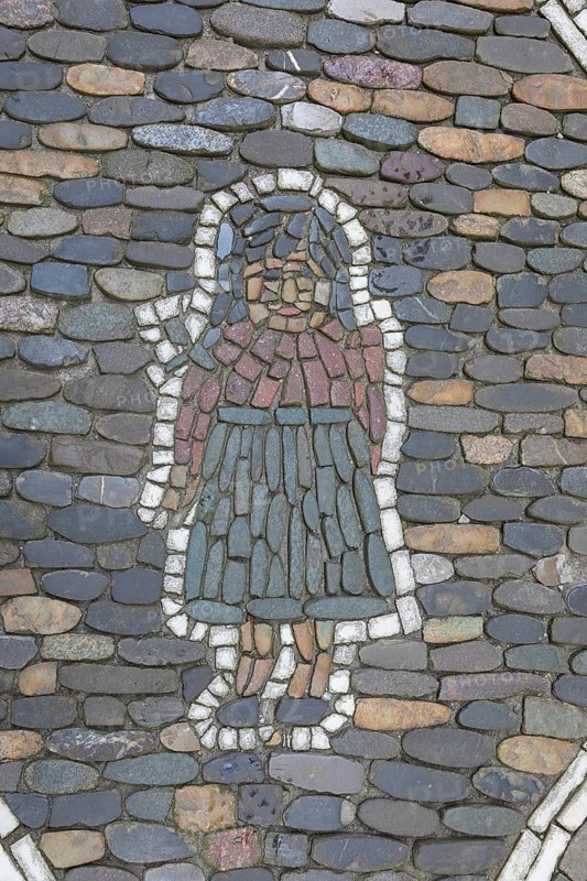 Female figure as pavement mosaic on the pavement