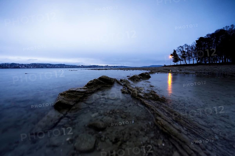 Storm warning light in the morning during a storm at Lake Constance