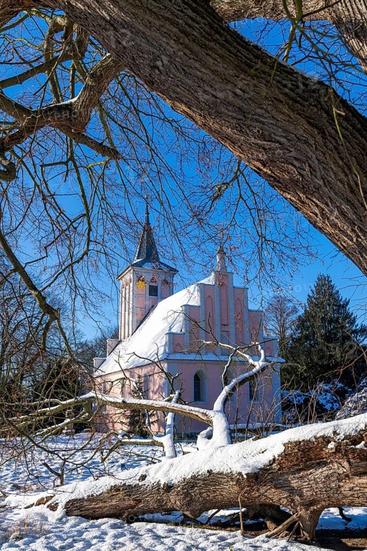 Village church in Lenne Park Criewen in winter