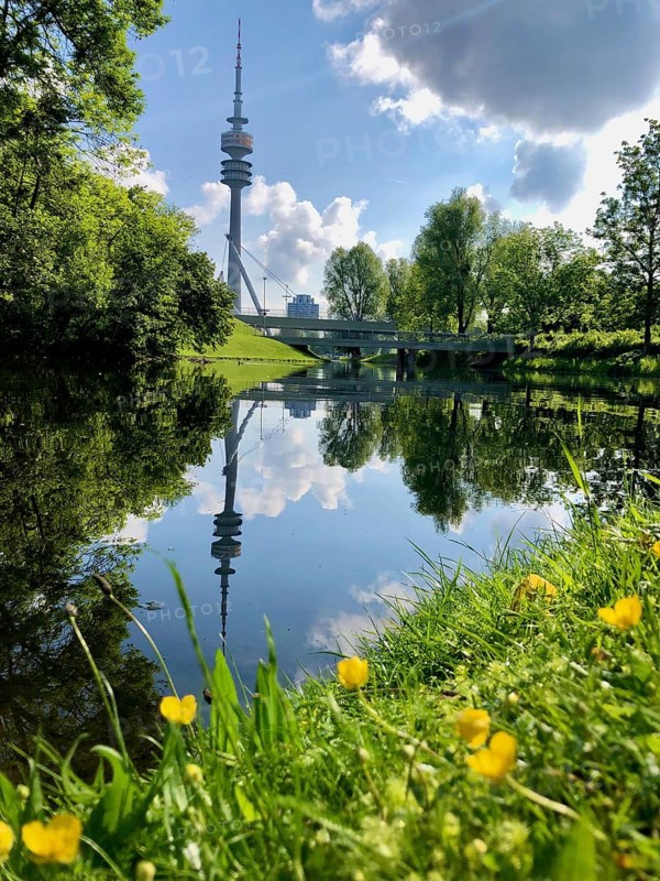 Olympic Tower reflected in the lake