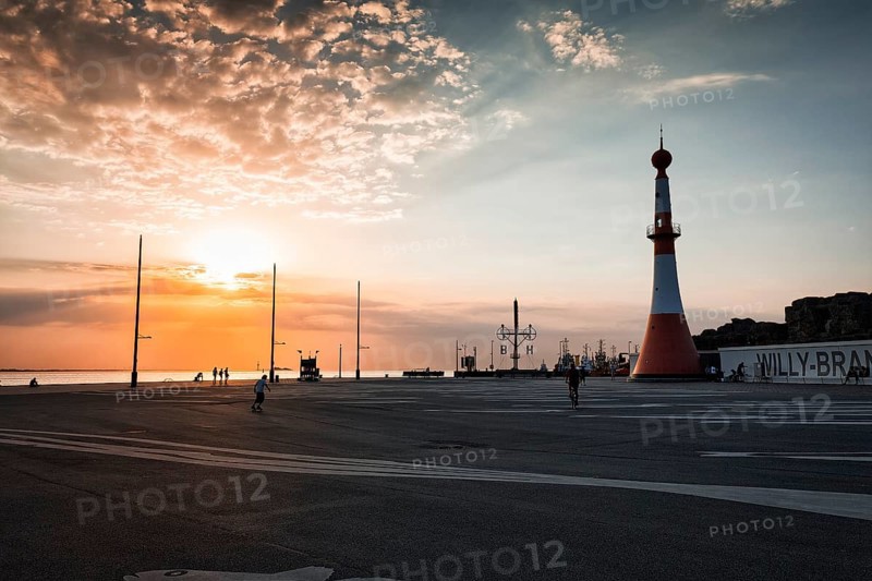 Willy-Brandt-Platz with lighthouse Unterfeuer at sunset