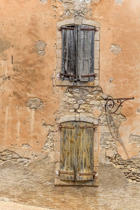 Two windows with shutters