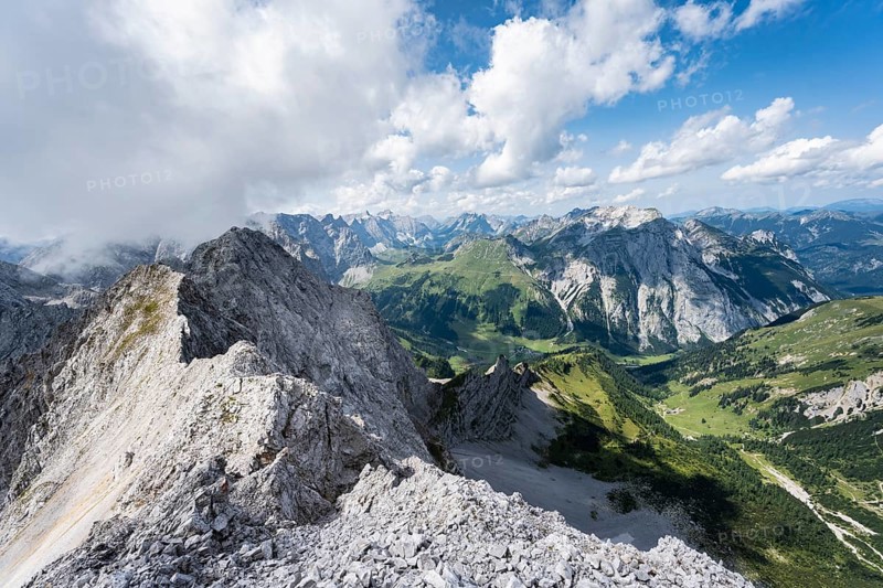 View from the summit of Lamsenspitze over rocky ridge to Schafkarspitze