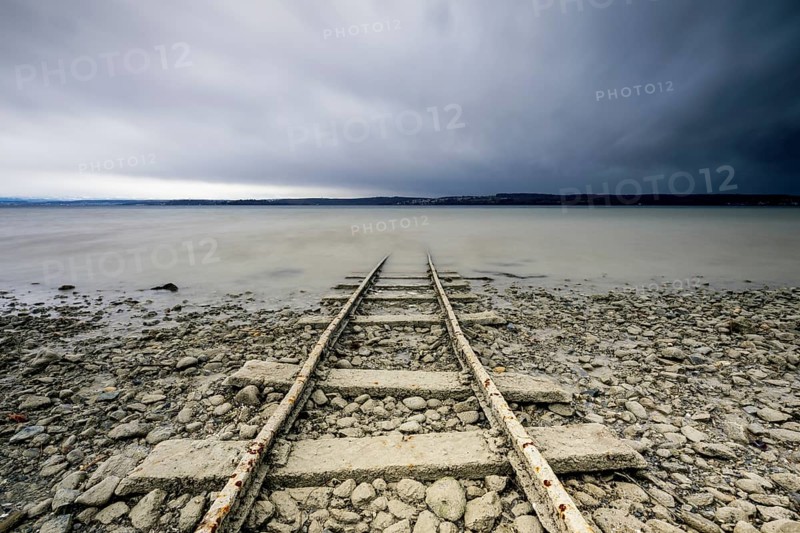 Old tracks lead into Lake Constance near Sturm