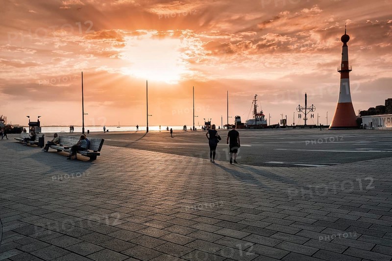Willy-Brandt-Platz with lighthouse Unterfeuer at sunset