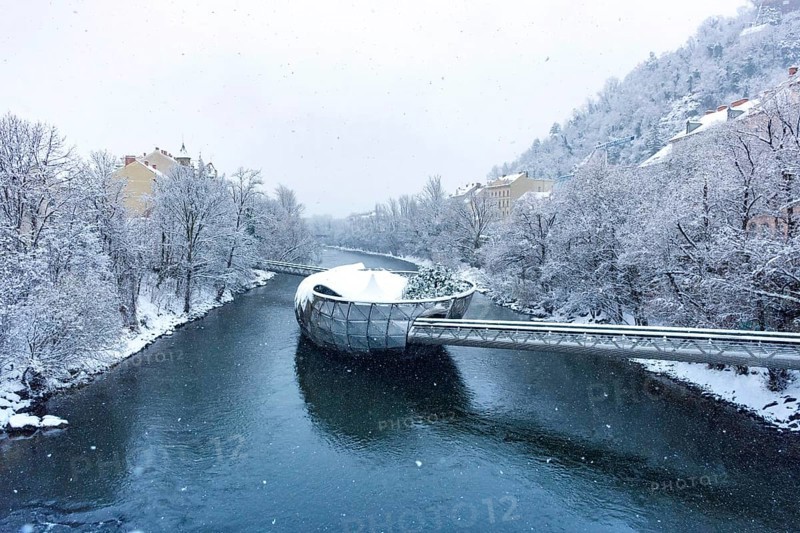 Mur river with Murinsel bridge in Graz