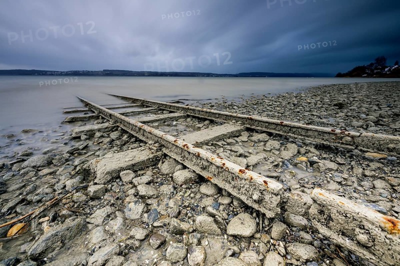 Old tracks lead into Lake Constance near Sturm