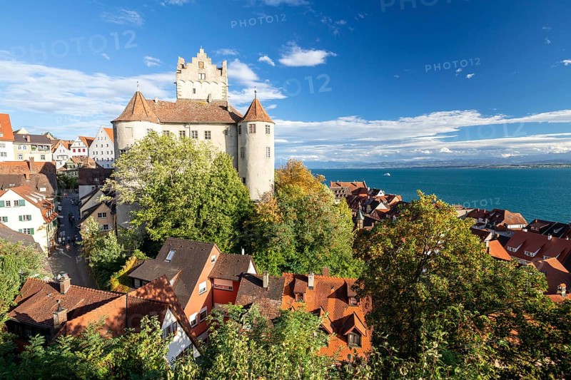 Meersburg Castle in the sunshine with a view of the Alps