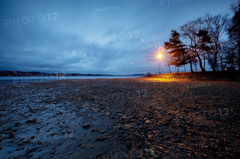 Storm warning light in the morning during a storm at Lake Constance