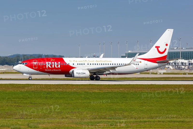A TUI Boeing 737-800 aircraft with registration D-ATUZ and the special livery RIU Hotels Resorts at Munich Airport