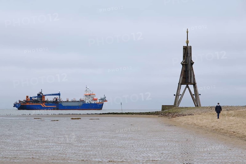 Dredger on the North Sea next to the Kugelbake