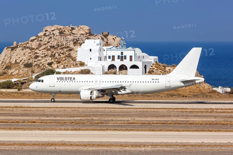 A Volotea Airbus A320 aircraft with registration number 9H-SLK at Santorini airport