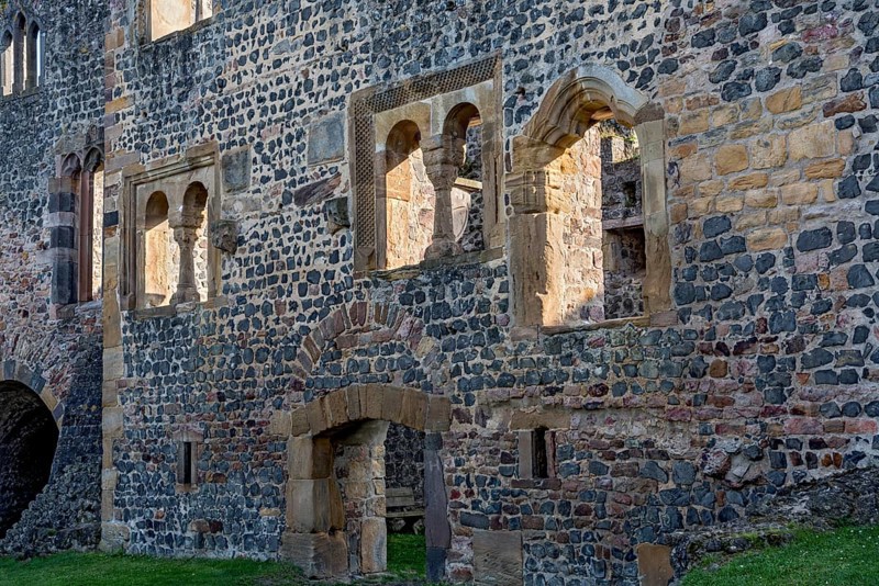 Facade of the Romanesque Muenzenberg Palas with windows and arcades