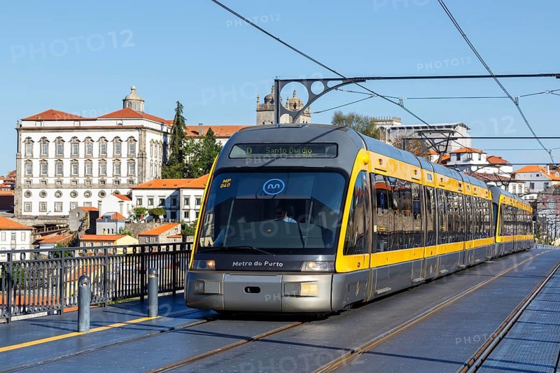 Modern light rail Metro do Porto tramway public transport transport traffic on the bridge Ponte Dom Luis I in Porto