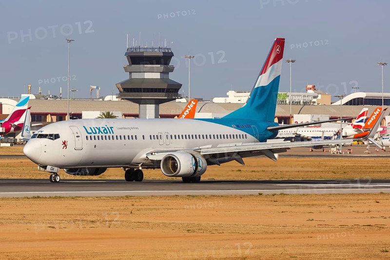 A Luxair Boeing 737-800 aircraft with registration LX-LGV at Faro airport