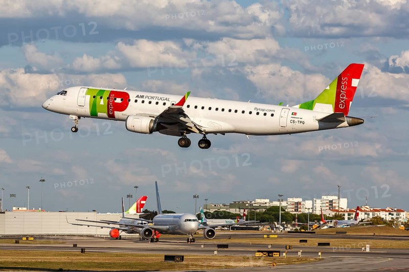 An Embraer 190 aircraft of TAP Portugal Express with registration CS-TPQ at the airport in Lisbon
