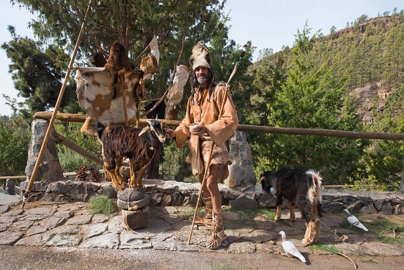 Goat herder in traditional garb