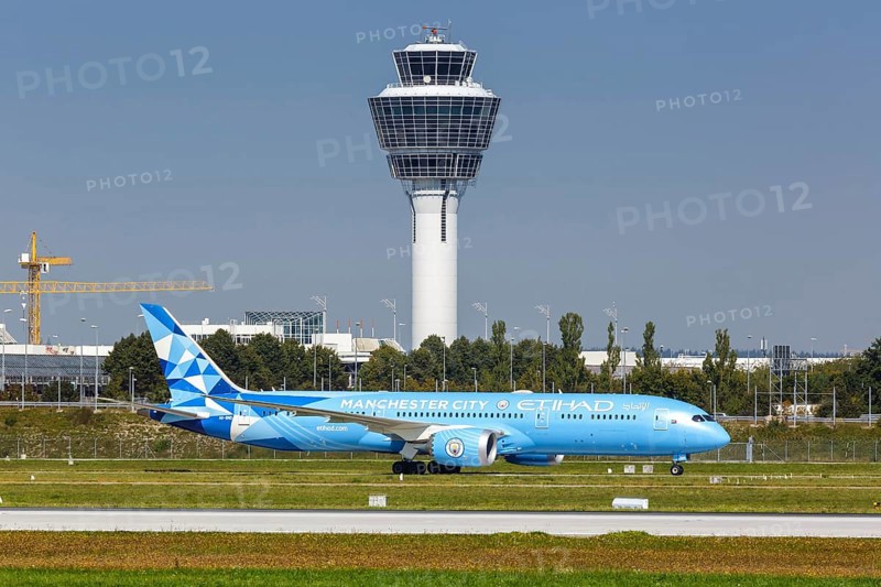 An Etihad Boeing 787-9 Dreamliner aircraft with registration A6-BND and Manchester City special livery at Munich Airport