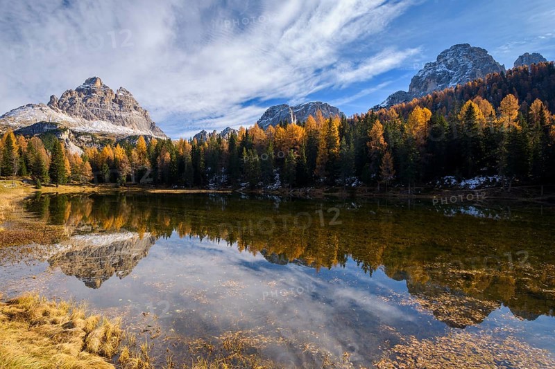 Antorno lake towards Tre Cime di Lavaredo mountain reflected in lake
