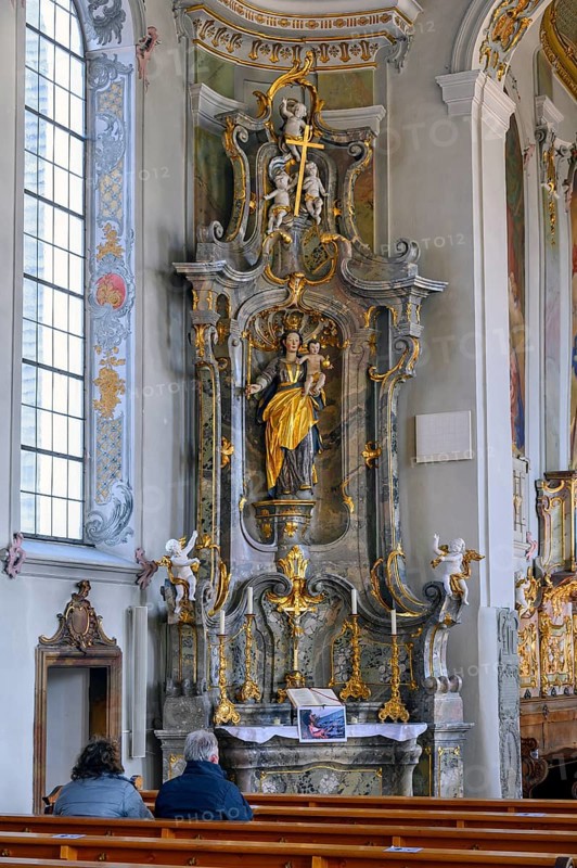 Side altar with figure of the Virgin Mary