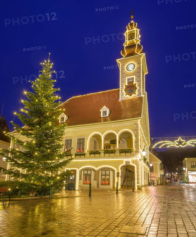 View to the main square with town hall with Christmas lights