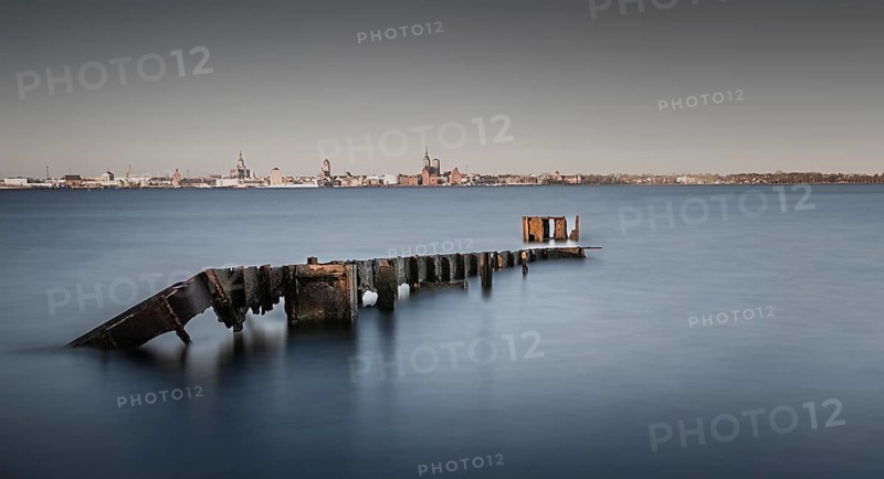 Long exposure of an old rusty jetty on the Baltic Sea coast off Stralsund
