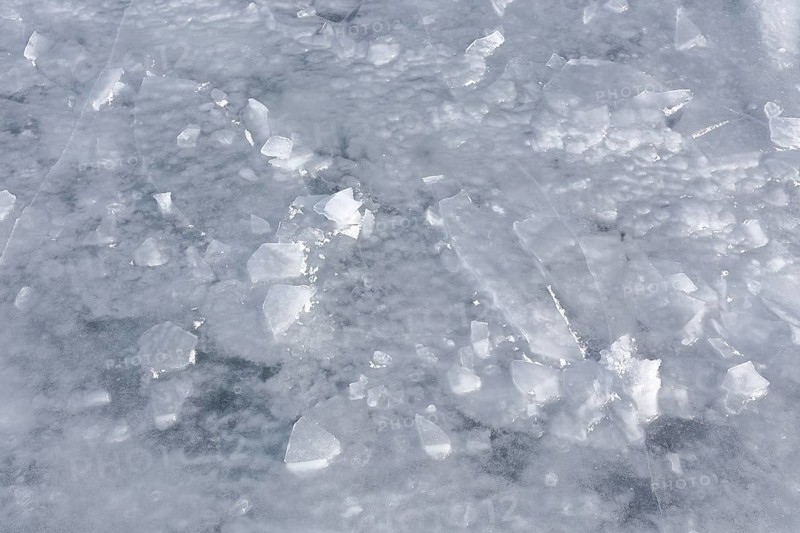 Chunks of ice on a frozen surface