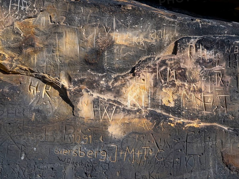 Names carved on stones at the rock formation Koenigstein
