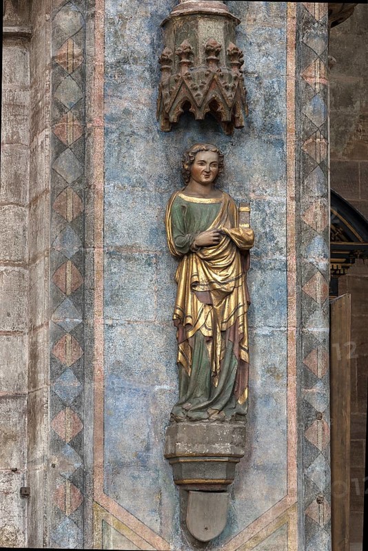 Coloured sculpture of a saint