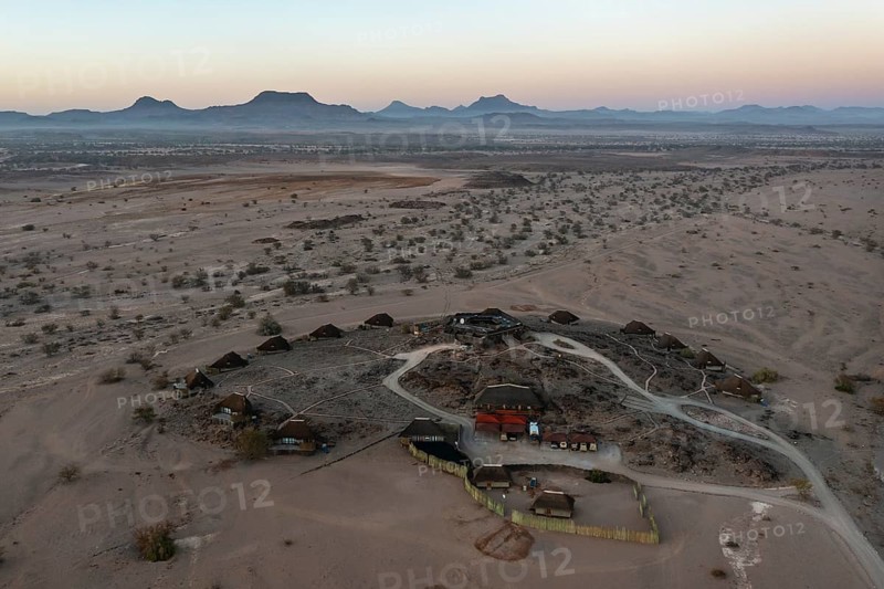 The Doro Nawas Camp and arid desert plains at the edge of the dry river bed of the Aba-Huab river