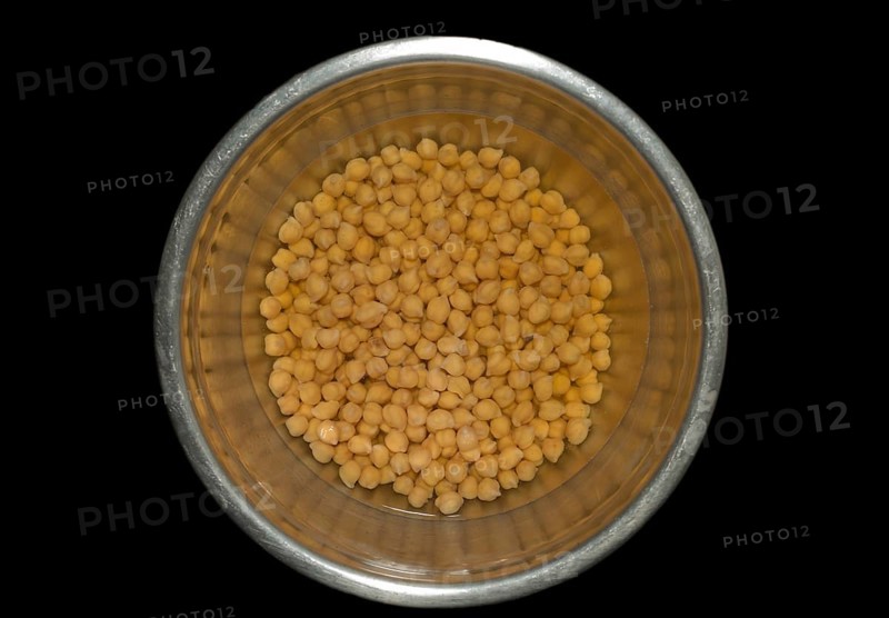 Raw chickpeas soaked in water