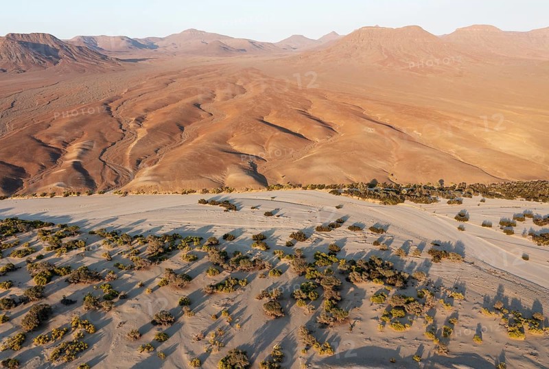 The dry bed of the Hoarusib river and adjoining badlands
