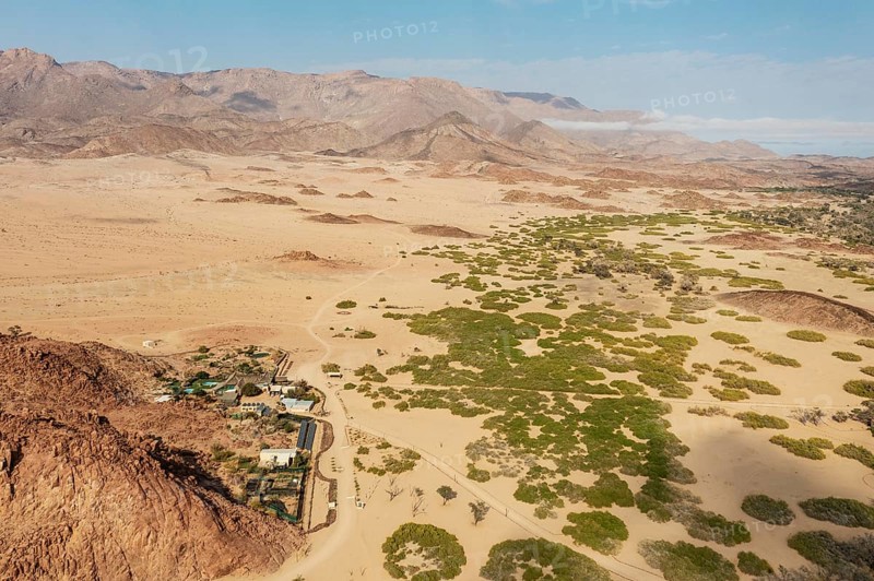 The Brandberg White Lady Lodge at the edge of the dry river bed of the Ugab river