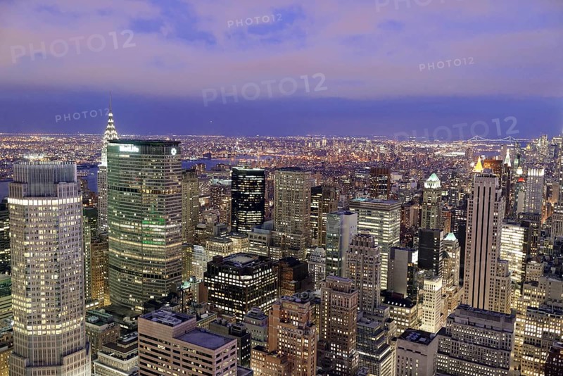 View of Midtown and Downtown Manhattan and Empire State Building from Top of the Rock Observation Center at sunset