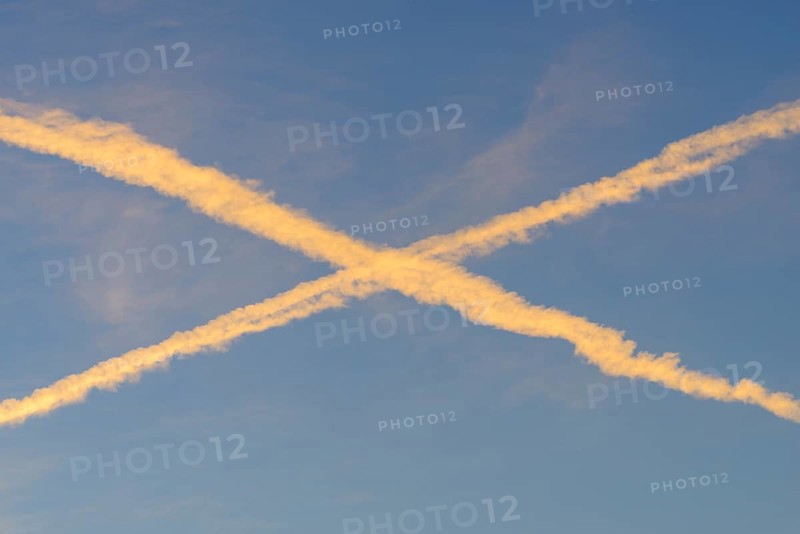 Crossing Contrails at Morning Light