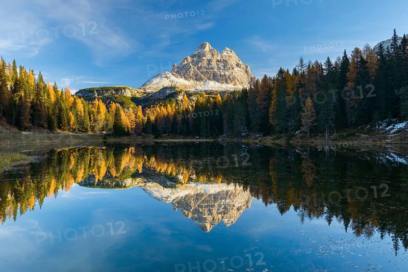 Antorno lake towards Tre Cime di Lavaredo mountain reflected in lake