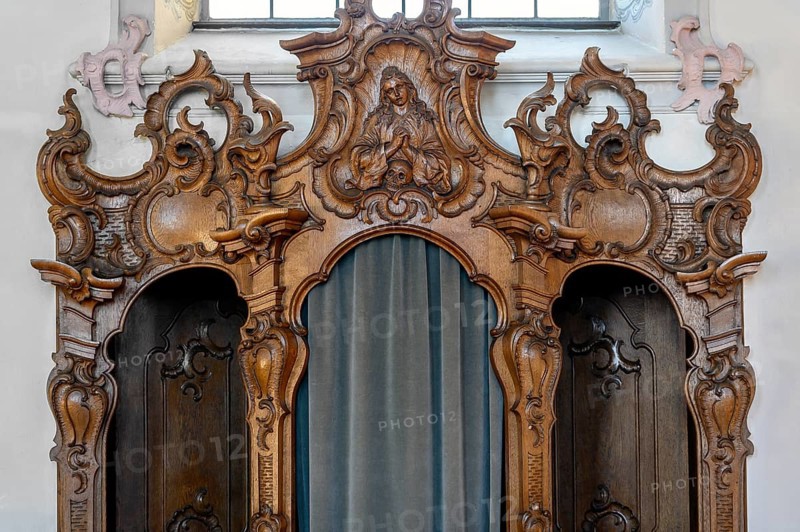 Richly carved confessional