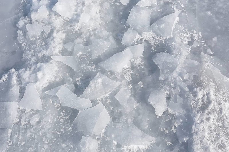 Chunks of ice on a frozen surface