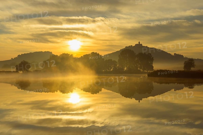 Wachsenburg Castle at Sunrise Reflecting in Lake