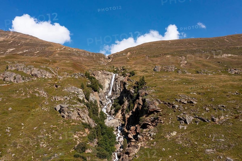 Mountain stream with waterfall in Rofental